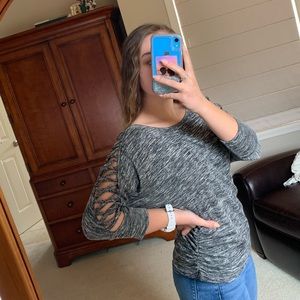 Grey long sleeved shirt w/ criss-cross on sleeves